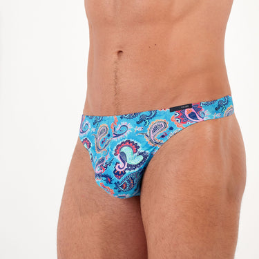 Blue patterned underwear worn by a person on a white background